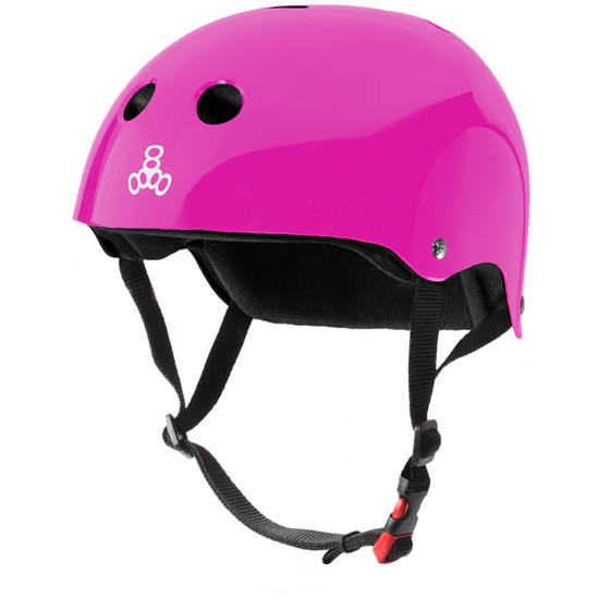 triple 8 Pink helmet with black straps on a white background